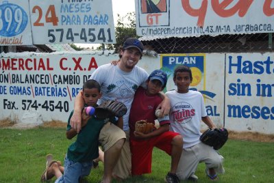Ben with Baseball kids.JPG